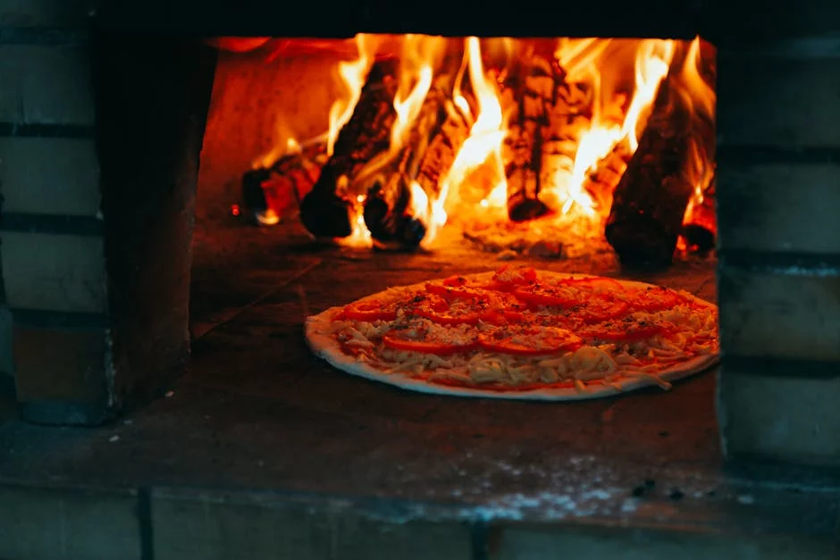 brick wood fired pizza oven flames cooking